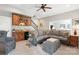 Relaxing living room featuring a wet bar, sectional sofa, and stylish decor at 1813 Wedowee Ct, Rock Hill, SC 29732