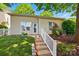 Charming backyard featuring stairs, grassy area, and shrubbery at 19416 Fridley Ln, Cornelius, NC 28031