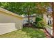 Well-maintained backyard showcasing lush landscaping and verdant lawn at 19416 Fridley Ln, Cornelius, NC 28031