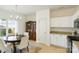 Cozy dining area with white accents and modern lighting fixtures at 19416 Fridley Ln, Cornelius, NC 28031