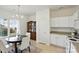 A Kitchen with a dining table and a wooden china cabinet at 19416 Fridley Ln, Cornelius, NC 28031