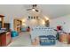 Large bonus room with vaulted ceiling, ceiling fan, seating area and plenty of space for storage at 2077 Taney Way, Fort Mill, SC 29707