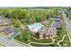 The community clubhouse features a swimming pool, lounge chairs, and manicured landscaping at 2077 Taney Way, Fort Mill, SC 29707
