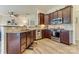 Well-equipped kitchen featuring stainless steel appliances, dark cabinetry, and granite countertops at 2077 Taney Way, Fort Mill, SC 29707