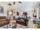 Spacious living room seamlessly connects to the kitchen and dining area, perfect for modern living and entertaining at 2077 Taney Way, Fort Mill, SC 29707