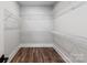 Spacious walk-in closet featuring wire shelving and wood-look floors at 2093 Fordhill St, Rock Hill, SC 29732