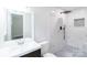 Bright bathroom showcasing a modern shower and white vanity with mirror at 212 Pine St, Rockwell, NC 28138