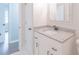 Bathroom featuring a vanity and a view into another room at 212 Pine St, Rockwell, NC 28138
