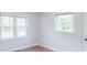 Bedroom featuring hardwood floors and windows at 212 Pine St, Rockwell, NC 28138