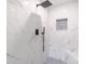 Close-up of a beautifully tiled shower with mosaic floor at 212 Pine St, Rockwell, NC 28138