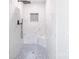 Modern bathroom featuring a large, tiled shower with a rainfall shower head at 212 Pine St, Rockwell, NC 28138