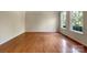 Spacious living room with hardwood floors and plenty of natural light at 2163 Woodstream Rd, Harrisburg, NC 28075