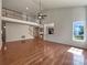 Open floor plan with soaring ceilings and hardwood floors at 2163 Woodstream Rd, Harrisburg, NC 28075