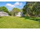 Charming single-story house with well-maintained lawn and mature trees at 224 Adrian St, Mount Holly, NC 28120