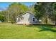 Charming single-story house with well-maintained lawn and mature trees at 224 Adrian St, Mount Holly, NC 28120