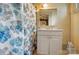 Clean bathroom featuring a vanity with cabinetry, and a floral shower curtain at 247 W Park Ave, Charlotte, NC 28203