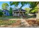 Charming brick bungalow with a covered front porch and mature trees in a walkable neighborhood at 247 W Park Ave, Charlotte, NC 28203