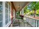 Charming front porch with seating area, perfect for enjoying a relaxing time outdoors at 247 W Park Ave, Charlotte, NC 28203