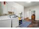 Functional laundry room equipped with a washer and dryer at 247 W Park Ave, Charlotte, NC 28203