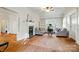 Bright living room with fireplace and built-in shelving, providing a cozy atmosphere for relaxing and entertaining at 247 W Park Ave, Charlotte, NC 28203