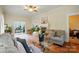 Cozy living room with hardwood floors and a view into another room at 247 W Park Ave, Charlotte, NC 28203