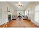 Cozy living room with fireplace and built-in shelving, great for both relaxing and entertaining at 247 W Park Ave, Charlotte, NC 28203