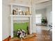 Bright living room featuring a decorative fireplace with mantel at 247 W Park Ave, Charlotte, NC 28203