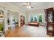 Spacious living room with hardwood floors, natural light, and open doorways, perfect for entertaining at 247 W Park Ave, Charlotte, NC 28203