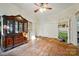 Living room with hardwood floors, built-in shelving, and a fireplace at 247 W Park Ave, Charlotte, NC 28203