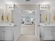 Bright bathroom with dual sinks that opens to the main bedroom at 253 Memory Ln, Rock Hill, SC 29732