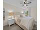Comfortable bedroom features a ceiling fan and large window at 253 Memory Ln, Rock Hill, SC 29732