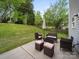 Comfortable outdoor seating area with an umbrella, perfect for relaxing and enjoying the backyard views at 253 Memory Ln, Rock Hill, SC 29732