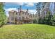 A beautiful backyard features a grass lawn and deck at 3005 Dream Catcher Cir, Fort Mill, SC 29715