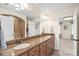 Bathroom features a double sink vanity with granite countertop, large mirror and walk-in shower at 3005 Dream Catcher Cir, Fort Mill, SC 29715