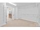 Walk-in closet connected to bathroom with installed shelving at 3005 Dream Catcher Cir, Fort Mill, SC 29715