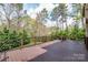 Expansive wood deck with wrought iron railing provides panoramic views of the surrounding landscape at 3005 Dream Catcher Cir, Fort Mill, SC 29715