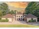 Stunning home with large lawn, circular drive, and attached garages at 3005 Dream Catcher Cir, Fort Mill, SC 29715