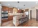 Gourmet kitchen with a center island, stainless steel appliances, and custom cabinetry at 3005 Dream Catcher Cir, Fort Mill, SC 29715