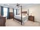 Spacious main bedroom boasts trey ceiling, ceiling fan, and large windows with natural light at 3005 Dream Catcher Cir, Fort Mill, SC 29715