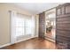 Office space boasts hardwood floors, barn door, and plenty of natural light at 3005 Dream Catcher Cir, Fort Mill, SC 29715