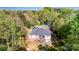 Aerial rear view of home featuring a large deck, patio, and fenced yard at 3232 47Th Avenue Ne Pl, Hickory, NC 28601