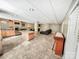 Spacious basement with a kitchen area, a comfortable seating area, and ample lighting at 3232 47Th Avenue Ne Pl, Hickory, NC 28601