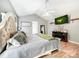 Cozy main bedroom with a plush bed, modern decor, a ceiling fan, and ample natural light at 3232 47Th Avenue Ne Pl, Hickory, NC 28601