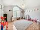 Spacious playroom with a large window, ceiling fan, and an array of colorful toys, perfect for  at 3232 47Th Avenue Ne Pl, Hickory, NC 28601