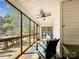 Inviting screened porch with outdoor dining and seating areas, perfect for entertaining and relaxing outdoors at 3232 47Th Avenue Ne Pl, Hickory, NC 28601