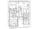Detailed first floor plan showcasing the layout of bedrooms, kitchen, living spaces and garage at 3605 Libby Ln, Midland, NC 28107