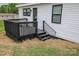 Backyard features a black deck and stairs at 409 N Apple St, Gastonia, NC 28054