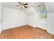 Bedroom with window seat, ceiling fan and hardwood floors at 426 Saint Michaels Way, Fort Mill, SC 29708