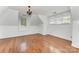 Bedroom with hardwood floors and windows offering ample natural light at 426 Saint Michaels Way, Fort Mill, SC 29708