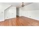 A bright bedroom showcasing hardwood floors, closet, and recessed lighting at 426 Saint Michaels Way, Fort Mill, SC 29708